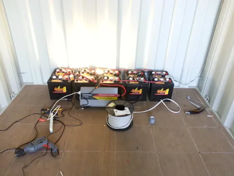 Early wiring and equipment laid out for the power installation.