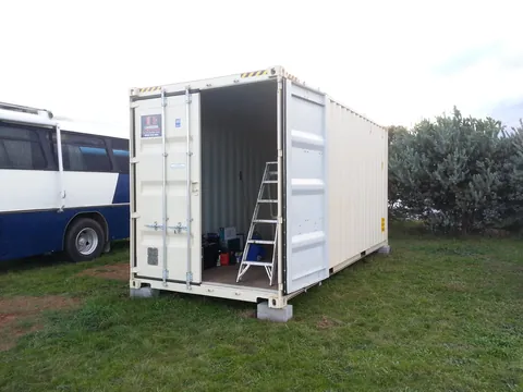 The bare container with its doors open.