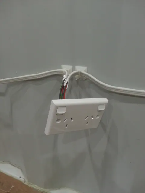 An early surface-mounted power outlet.