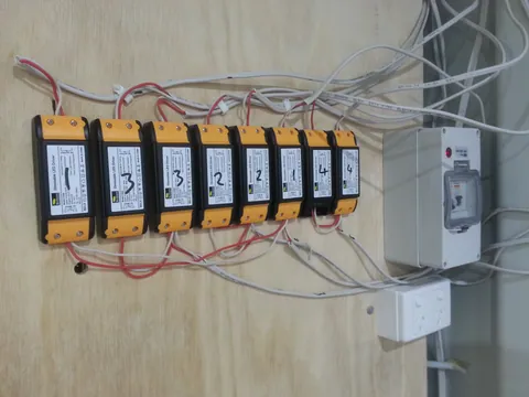 The numbered electrical units and their wiring on the mounting board.