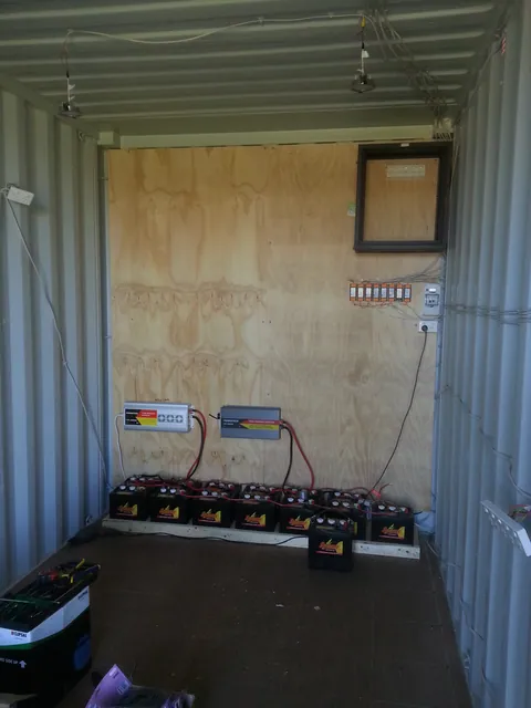 The wall cabinet positioned above the battery installation.