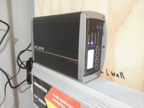 A computer mounted on the equipment wall.