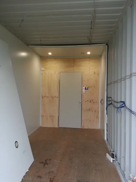 The main walls lined, with work continuing above.