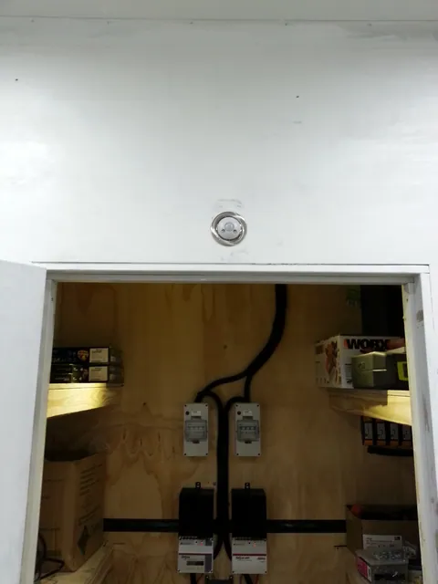 The service-area doorway and wall fittings.
