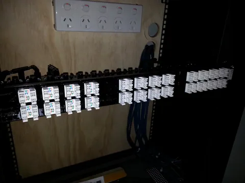 Network terminations being assembled on a mounting strip.