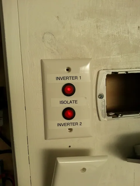 A labelled pair of switches beside the power outlets.