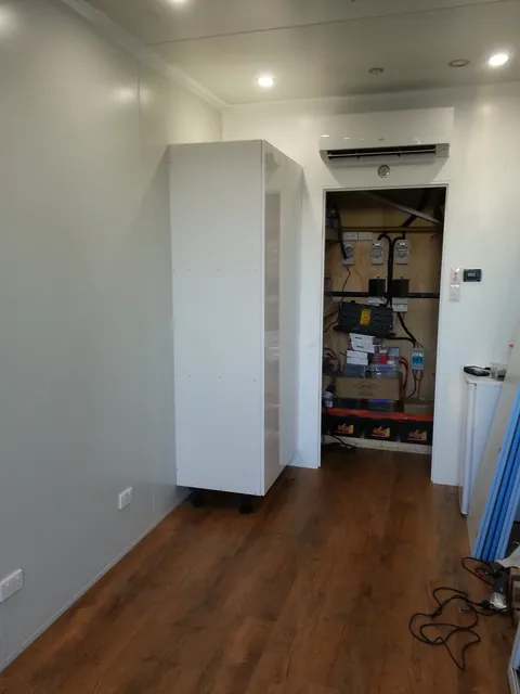 The first tall cabinet with its doors fitted.