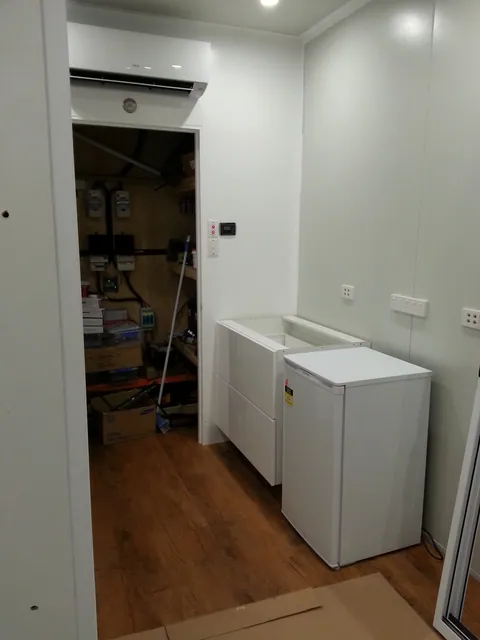 Base cabinets introduced on the opposite side.