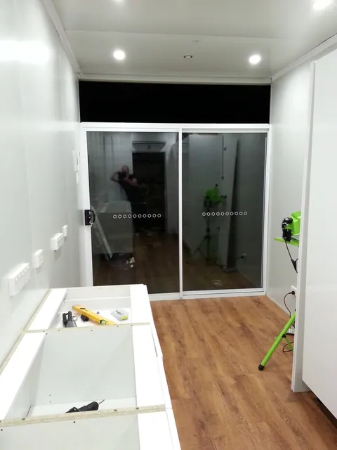 The sliding glass entrance viewed from inside.