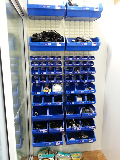Small-parts bins added near the entrance.