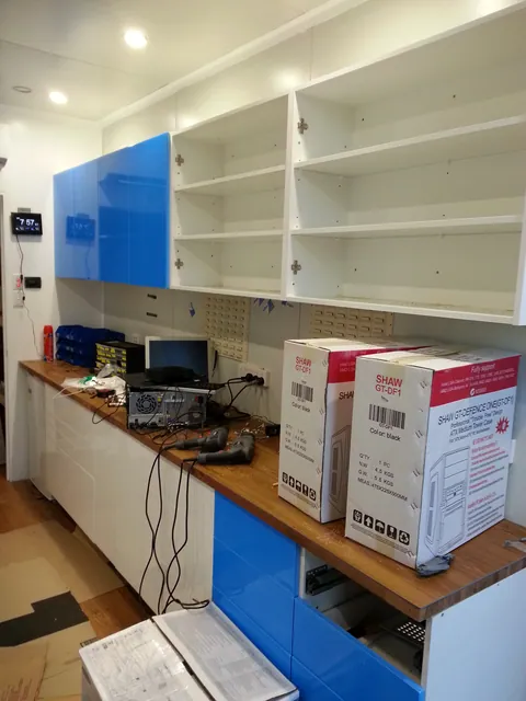 The upper shelving and cupboard interiors before all doors are fitted.