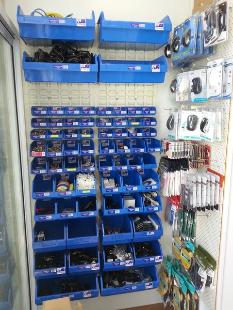 The small-parts bins and accessory display at the entrance.