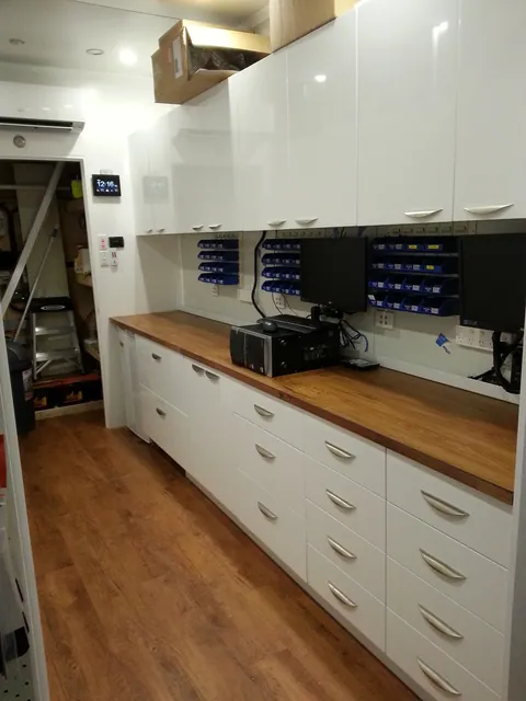 The equipped repair bench after the late-night work.
