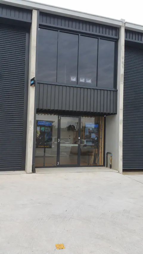 Posters begin to fill the blue shopfront windows in April.