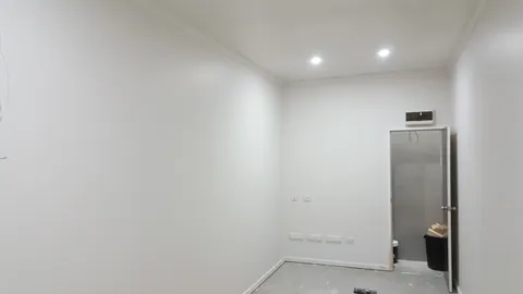 White paint changes the feel of the narrow room.