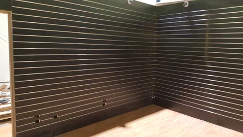 The slatwall corner is nearly complete.
