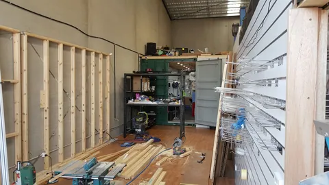 Timber framing extends down the longer wall.
