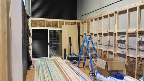 Framing continues above the lower wall sections.