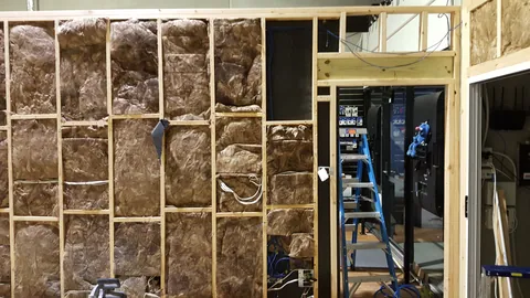 Insulation reaches the upper corner of the wall.