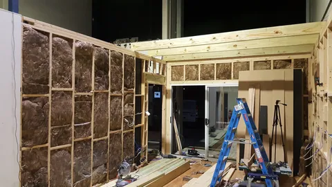 Ceiling joists start bridging the space.