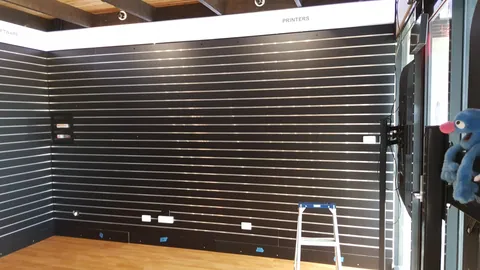 The finished display wall is ready to receive stock.