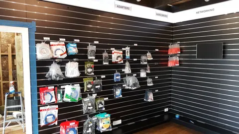 Stock begins filling the completed wall.