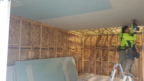 Ceiling sheets are fitted overhead.