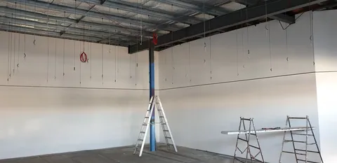 Ladders and tools brought in to begin work on the interior.