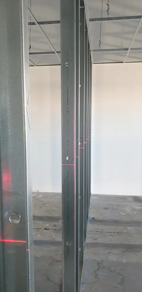 A doorway taking shape in the metal framing.