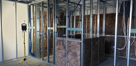 The partly insulated partitions and the remaining open framework.