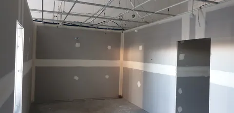 Inside the workshop after the wall lining has been fitted.