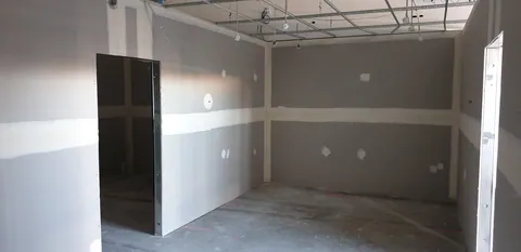 A new internal doorway in the lined partitions.