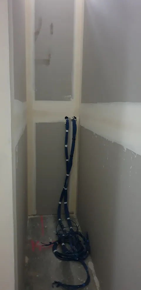 A small service area left accessible during the fit-out.