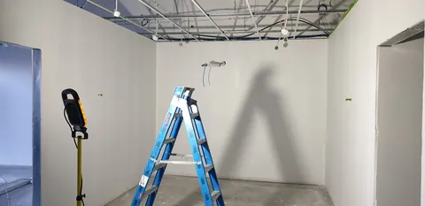 Painting continues around the workshop.