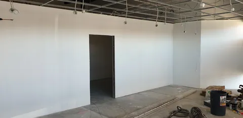 The painted retail area in daylight.