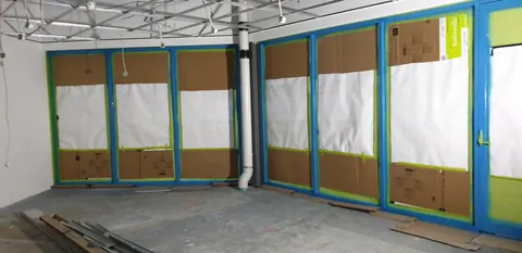 The front glazing masked in preparation for painting.