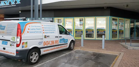 The Crawfords van outside the Opening Soon shopfront.