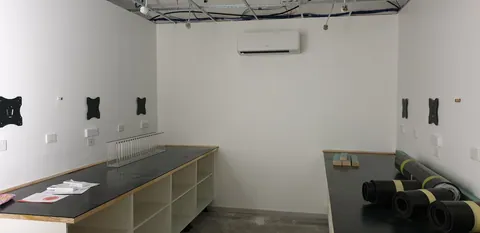 The opposing workbench and air conditioner during installation.