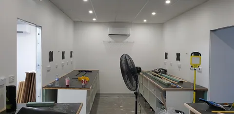 The workshop lit by its newly completed ceiling lights.