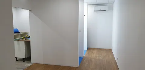 The passage with its new flooring laid.