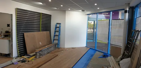 The retail floor progresses towards the front windows.