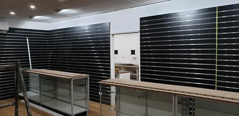 The counter work viewed across the showroom.