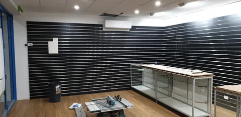 Timber counter tops fitted above the cabinets.
