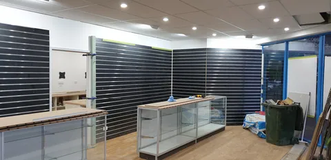 The showroom with its new workshop door in place.