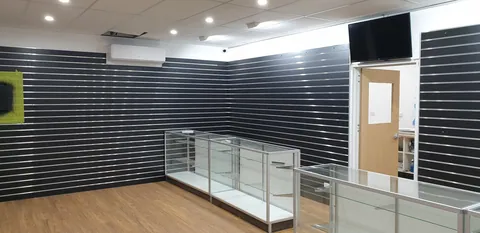 The completed display walls and counter layout from another angle.