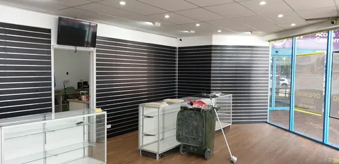 A screen added above the retail display area.