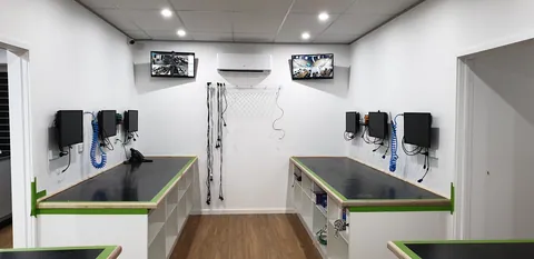 The workshop benches and compressed-air reels during final fit-out.