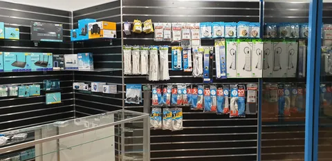 Accessories arranged on the retail display wall.