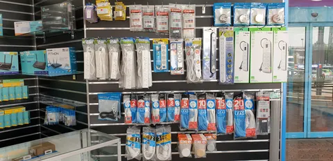 The expanded accessory display along the retail wall.