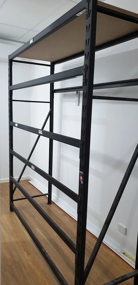 Additional shelving assembled for storage.